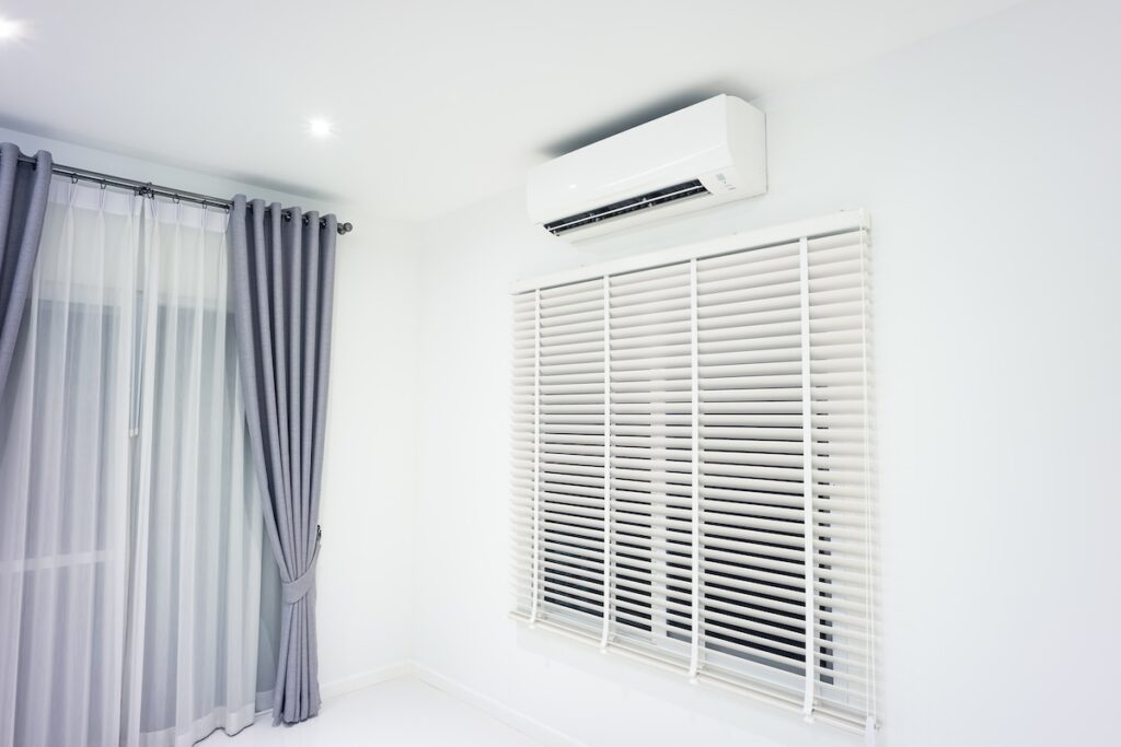 Ductless air conditioning unit on wall
