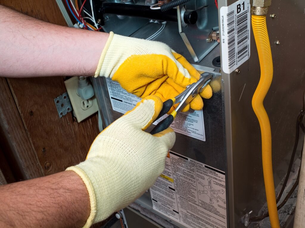 Technician fixing wiring