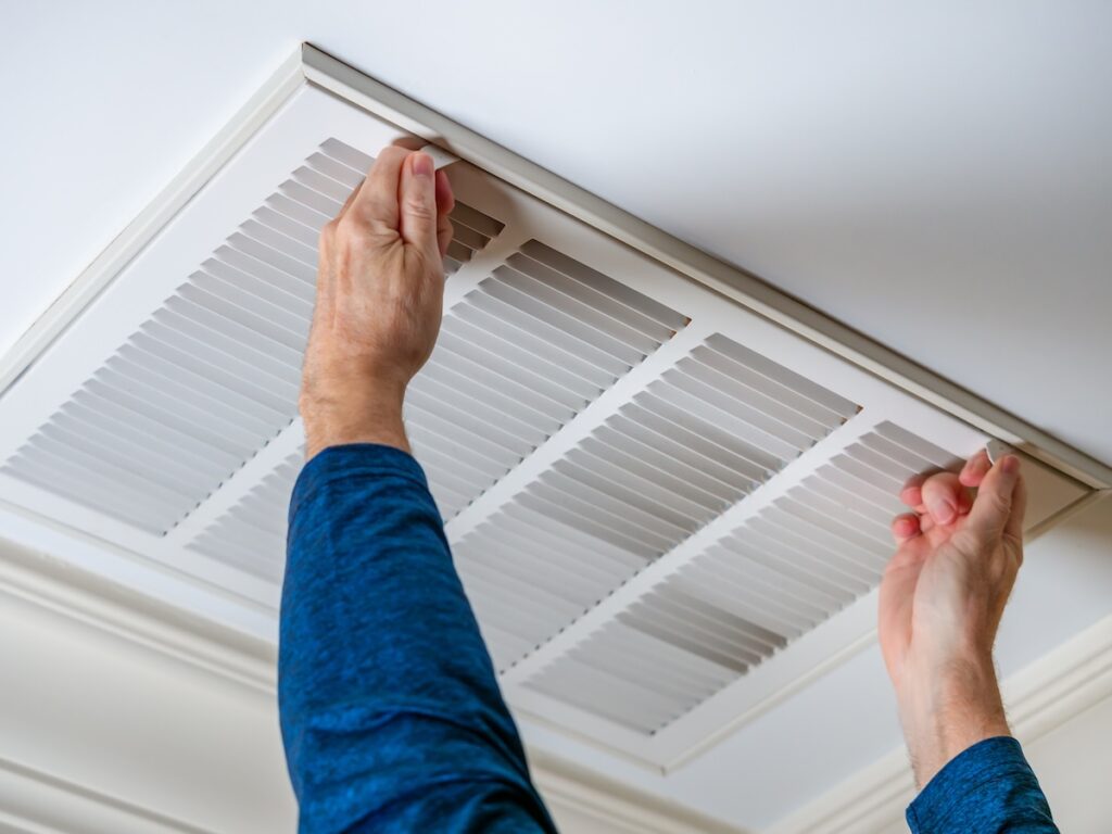 Ceiling air vents being installed