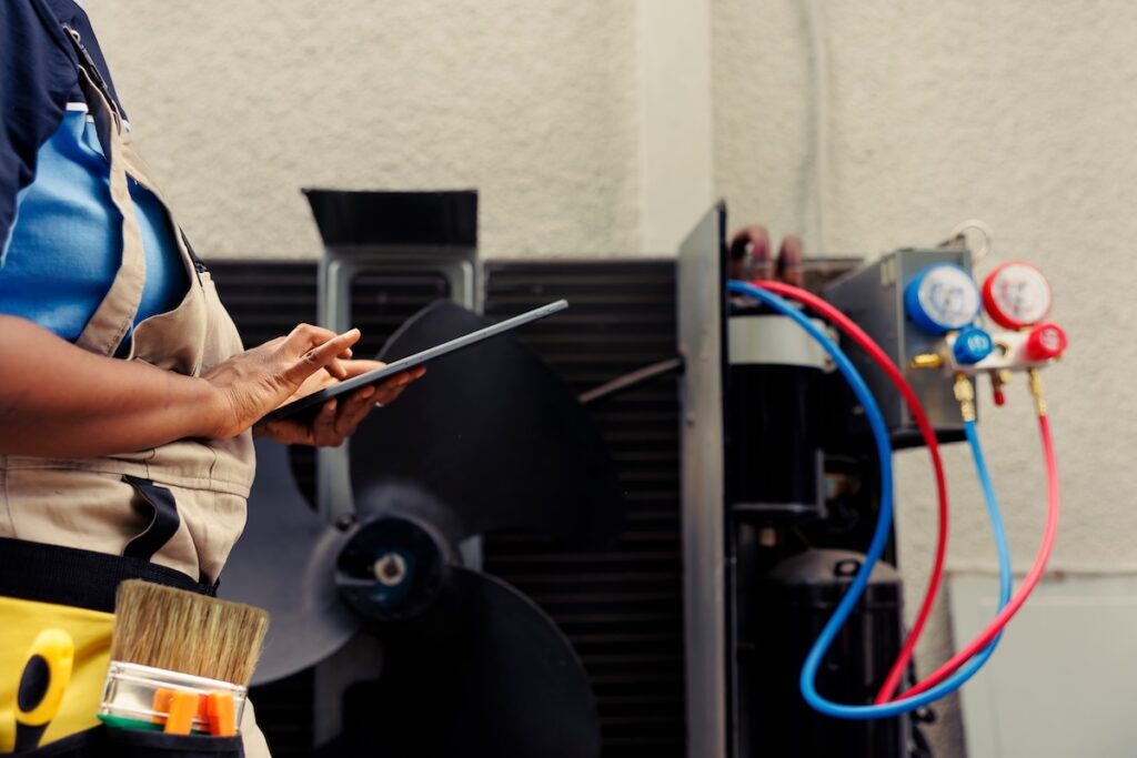 HVAC system being tested to see refrigerant levels