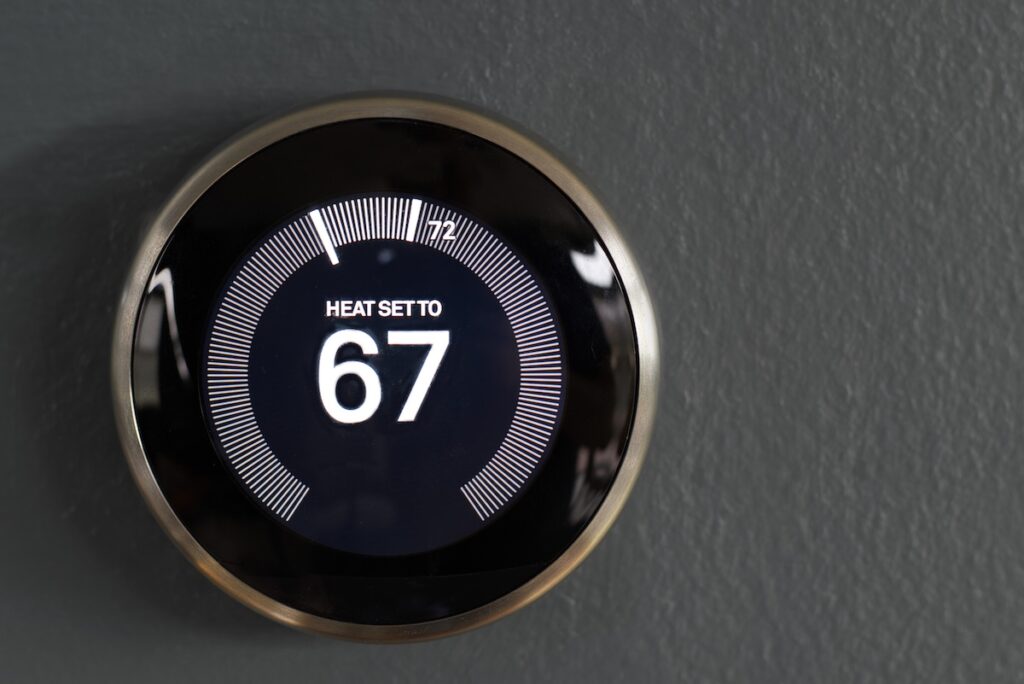 Home thermostat set to 67 degrees